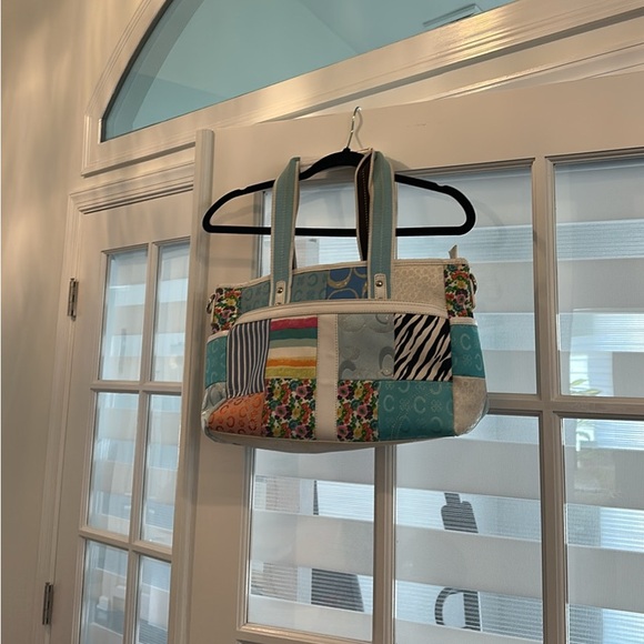 Coach Handbags - COACH bag. Multicolor pattern, leather is peeling